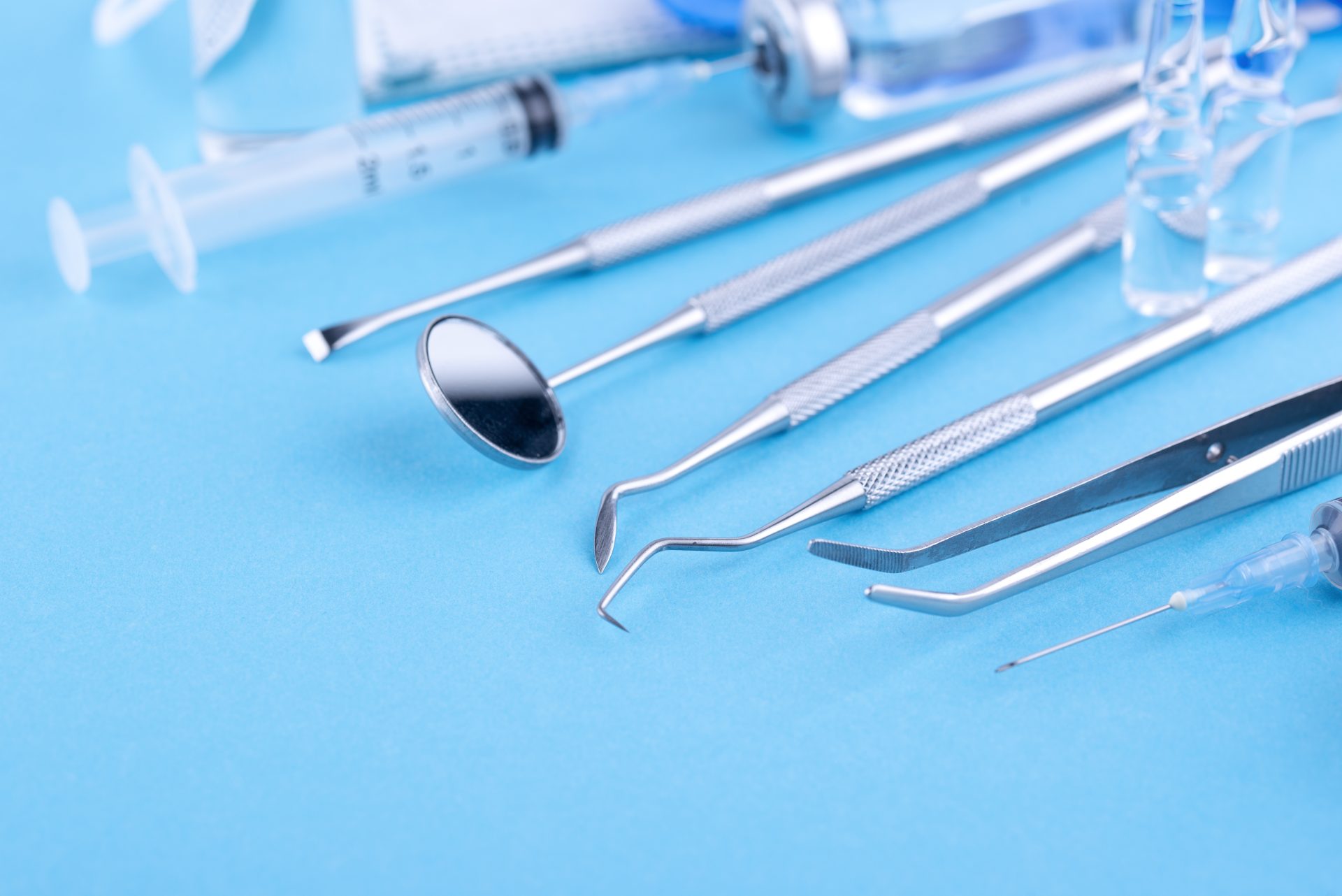 vials-medical-tools-arrangement-high-angle
